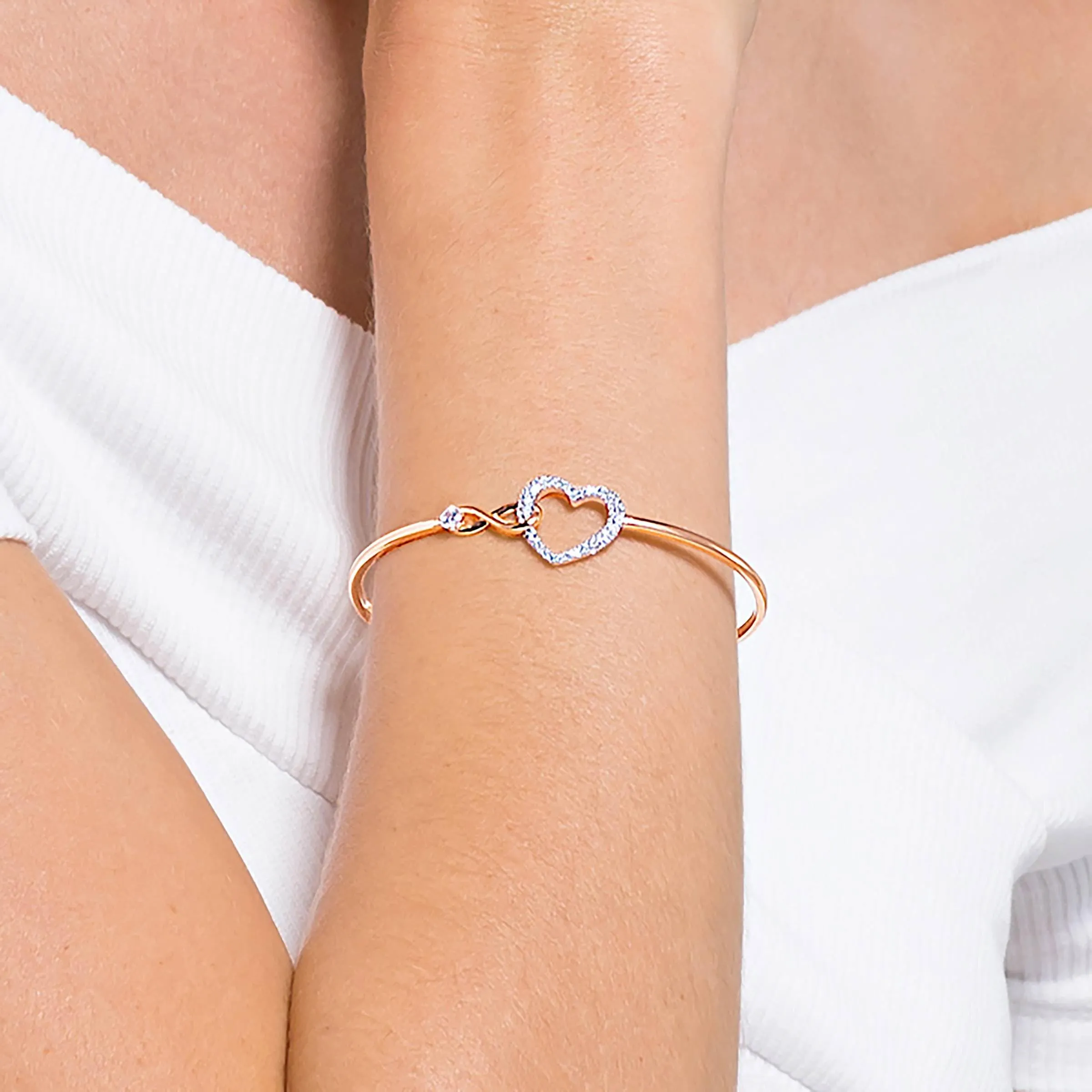Swarovski Hyperbola Women's Bangle Bracelet with a Rose-Gold Tone Plated Bangle, Clear Crystals and Lobster Clasp